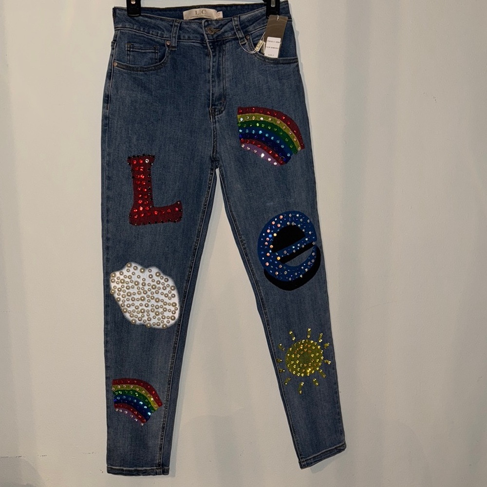 Vibrant High Rise Blue Jeans with Red Accents